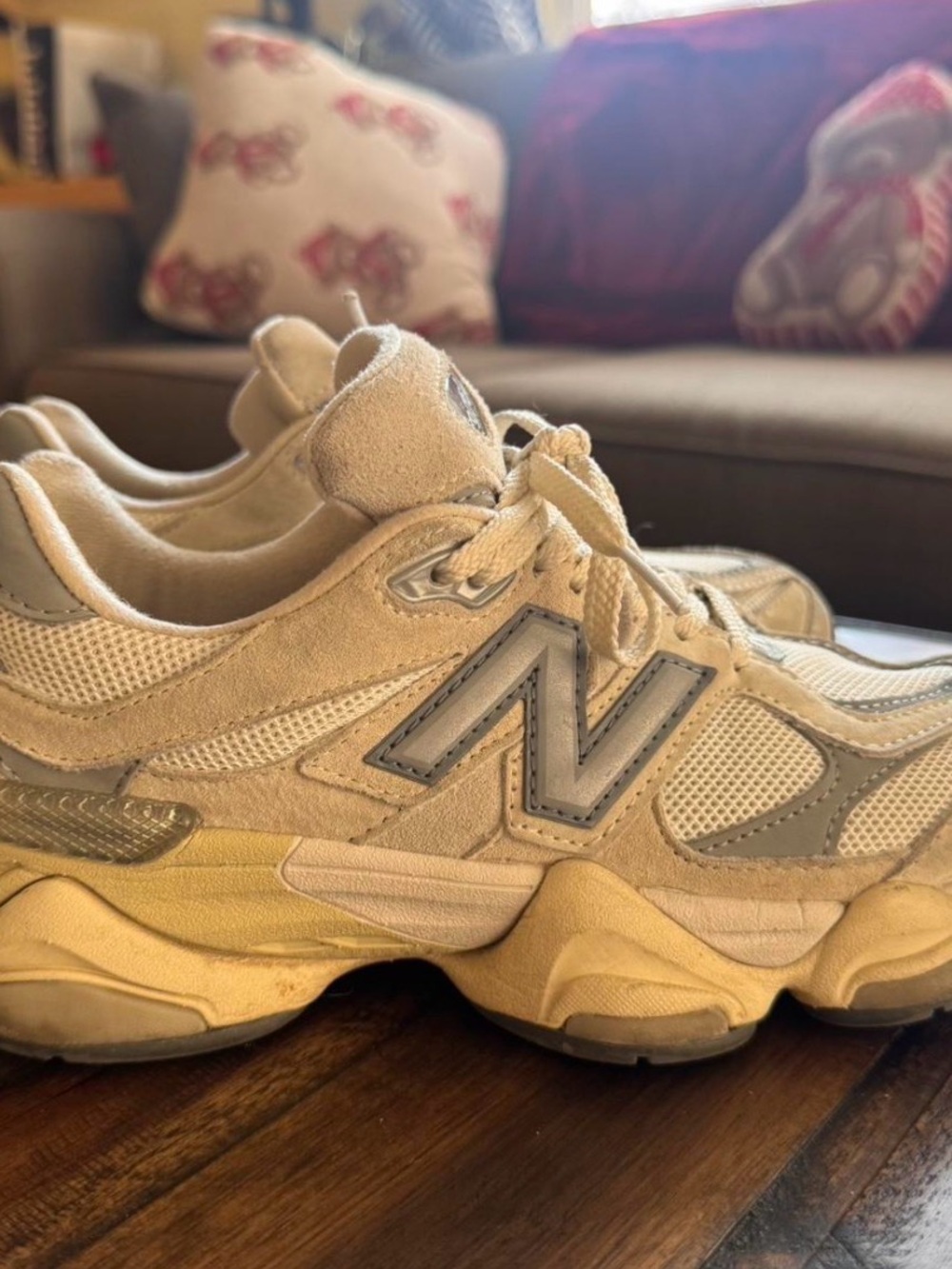 New Balance 9060 cream trainers.